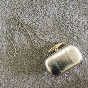 Women’s DVF metallic gold crossbody clutch bag